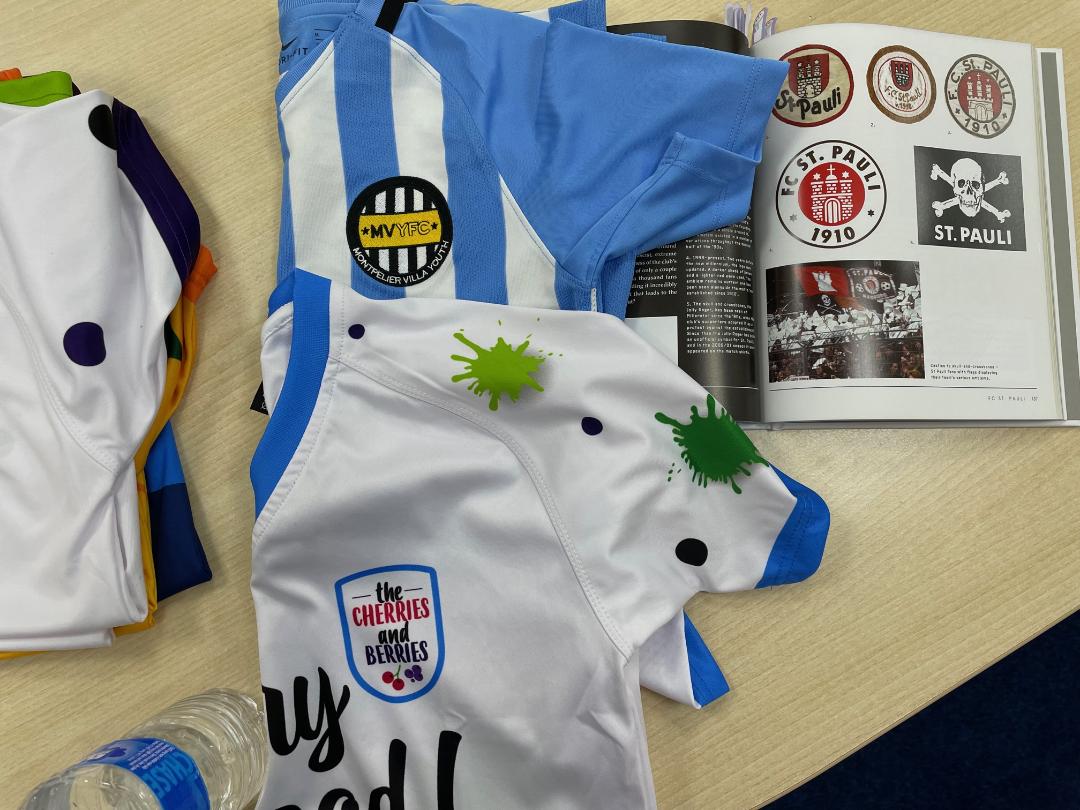 The results of a zonal session (2 new shirts, with custom designs) with a football badges book for inspiration')